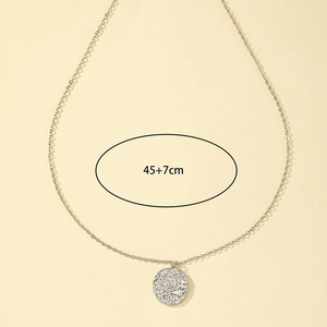 Silver sun coin pendant necklace detail with 45+7cm adjustable chain link length