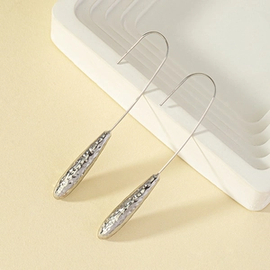 Elegant silver hammered teardrop dangle earrings for women with minimalist hook design