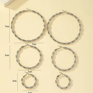 Size chart showing 3cm, 5cm, and 7cm diameters for silver twisted hoop earrings set