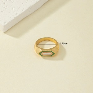 Golden geometric enamel ring with green, pink, and white hexagonal patterns and 1.75cm diameter