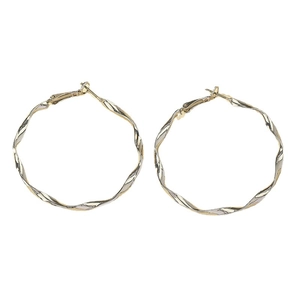 Créoles torsadées minimalistes en or et argent avec une texture métallique en spirale