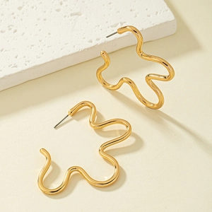 Minimalist gold wavy irregular hoop earrings with fluid artistic curved design