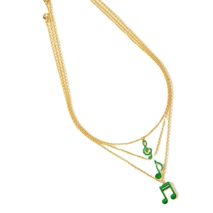 Three-layer gold necklace set featuring green enamel musical note pendants on a plain white background
