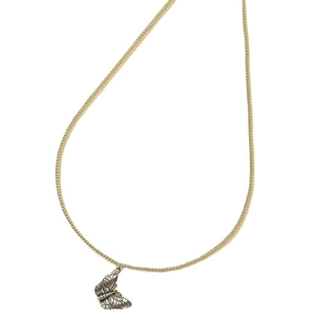 Vintage gold butterfly necklace with intricate filigree pendant on white background