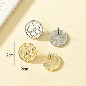 Floral relief round stud earrings set in gold and silver matte alloy finish, 2cm diameter