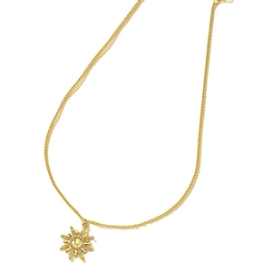 Élégant collier pendentif soleil doré avec design minimaliste et chaîne fine dorée