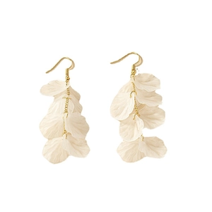 Elegant gold hook earrings featuring layered white petal tassels and chic resin shell accents