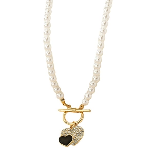 Elegant pearl heart necklace with black enamel, rhinestone pendant, and golden OT clasp