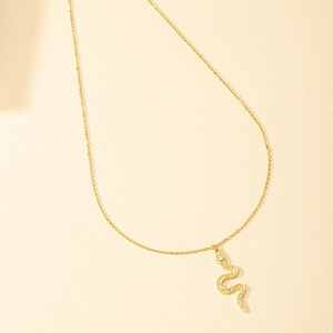 Chic golden snake pendant necklace with pavé crystals on a delicate cable chain