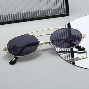 Retro oval sunglasses with gold metal double bridge frame and dark lenses