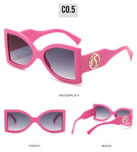 Vues détaillées des lunettes de soleil roses avec logo S doré et verres dégradés