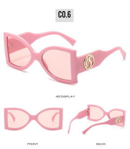 Vues détaillées des lunettes de soleil roses surdimensionnées avec décor en métal S doré