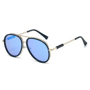 Classic aviator sunglasses with black and gold frames and translucent blue lenses