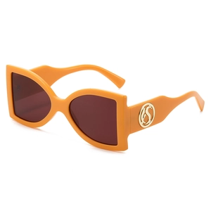 Lunettes de soleil carrées oversize orange vif avec logo S doré sur les branches