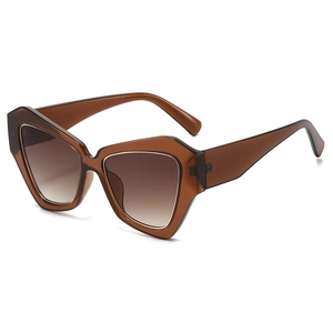 Fashionable brown polygon sunglasses with gradient lenses in a 45-degree angle shot