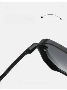 Close-up of durable metal hinge on black matte fashion sunglasses with white background