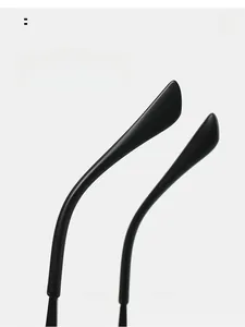 Detail of matte black curved sunglasses arms showing ergonomic design and comfortable fit