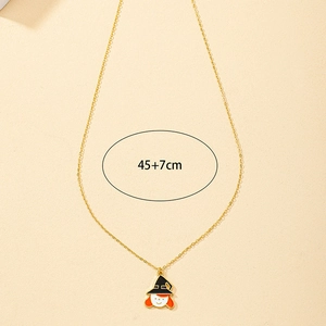 Collier pendentif sorcière Halloween émail avec cheveux orange et chaîne dorée 45+7cm