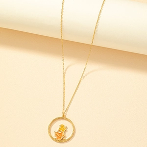 Golden enamel necklace featuring orange and yellow maple leaf circle pendant on cream background