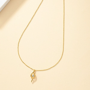 Collier doré élégant avec pendentif en S incurvé et pierre précieuse étincelante