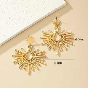 Chic oversized gold sunburst earrings with ray design, 6.6cm height by 5.4cm width