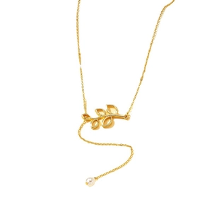 Collier élégant doré avec feuilles évidées et pendentif perle pour femme chic et tendance