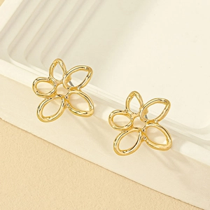 Minimalist golden alloy flower stud earrings with elegant hollow petal geometry