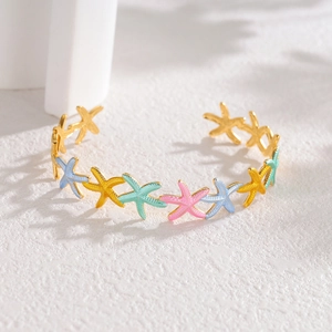 Bracciale rigido in acciaio inossidabile placcato oro 18k con stelle marine smaltate