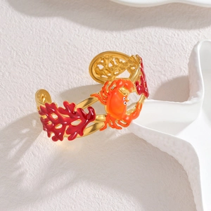 18K gold plated stainless steel open bangle with coral and crab enamel details