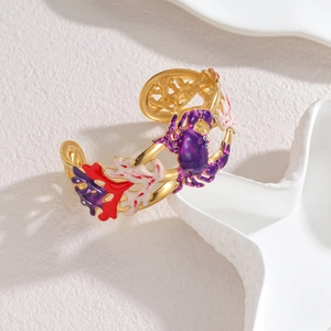 18k gold plated open bangle featuring purple crab and red coral enamel sea motifs