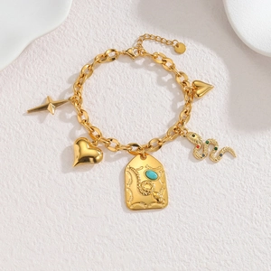 Bracelet chaîne en or 18k vintage avec breloques turquoise et pendentifs serpent