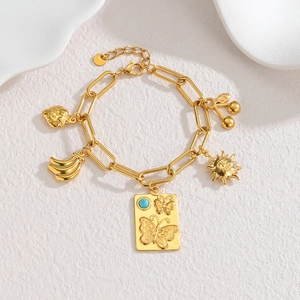 Bracelet rétro plaqué or 18k avec pendentif turquoise et breloques de fruits