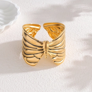 18k gold butterfly statement cuff bracelet in stainless steel with intricate wing texture