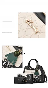 Detailansicht des 3-teiligen Handtaschen-Sets mit lasergeschnittenen Blumenmustern und Logo