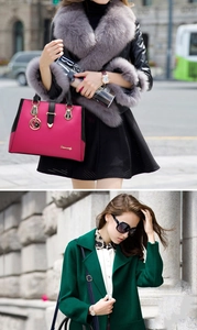 Detail of rose red leather handbag with heart charm and green winter coat look