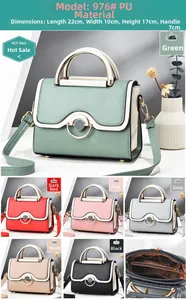 Detail view of multi-compartment interior and color options for contrast PU leather crossbody bag