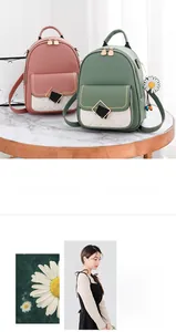 Chic quilted faux leather backpacks in pink and green with daisy charm detail