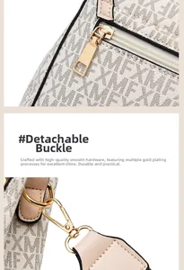 Close-up of golden hardware, detachable buckle and MFX print on beige crossbody bag