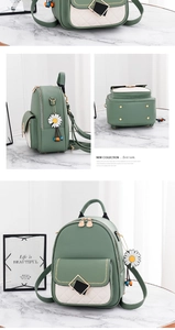 Detail view of sage green quilted backpack with daisy charm and multi-angle product shots