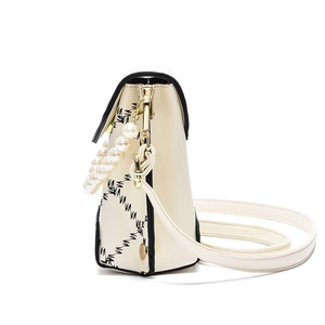 Chic beige PU leather shoulder bag with black embroidery and elegant pearl chain handle