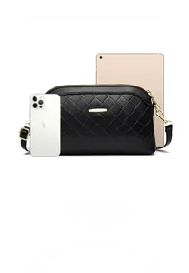 Black quilted PU leather crossbody bag size comparison with tablet and smartphone