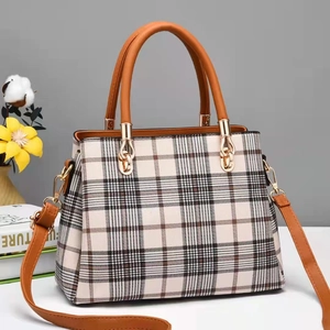 Retro plaid tote bag with brown leather handles and adjustable shoulder strap for women
