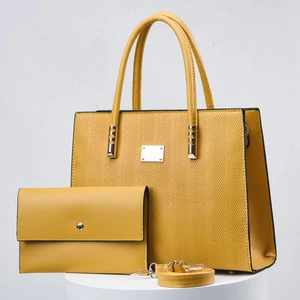 Three-piece yellow fashion tote bag set with textured exterior and matching clutch
