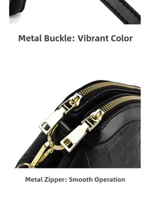 Close-up of golden hardware clasps and smooth zippers on black quilted leather bag