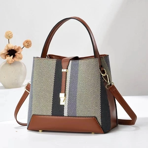 Sac seau rayé élégant en tissu contrasté avec bandoulière réglable en cuir marron