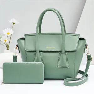 Green two-piece handbag and wallet set with gold hardware and FASHION & BAG logo