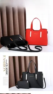 Détails d'un ensemble de sacs à main en cuir grainé rouge et noir avec porte-monnaie