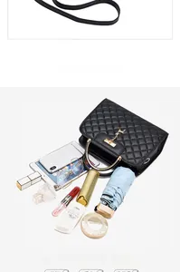Quilted black crossbody bag with interior storage for phone, umbrella, and makeup items