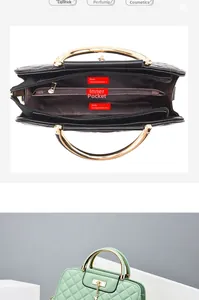 Detailed interior view of quilted leather handbag with three compartments and gold handles