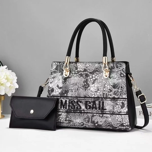 Contrast floral print tote bag set with Miss Gail logo and matching black clutch
